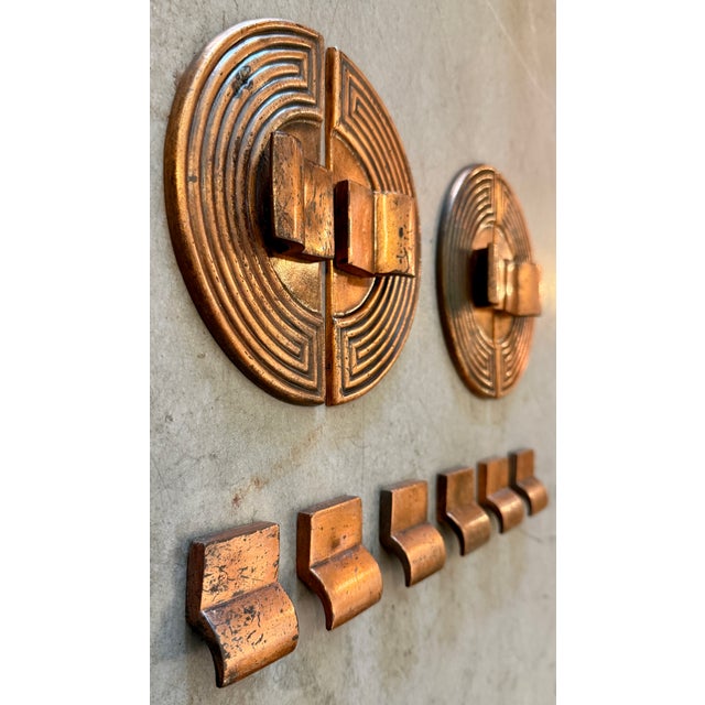 Set of 10, heavy, Art Deco, architectural cabinet hardware made of solid copper with a rich aged patina. The set contains...
