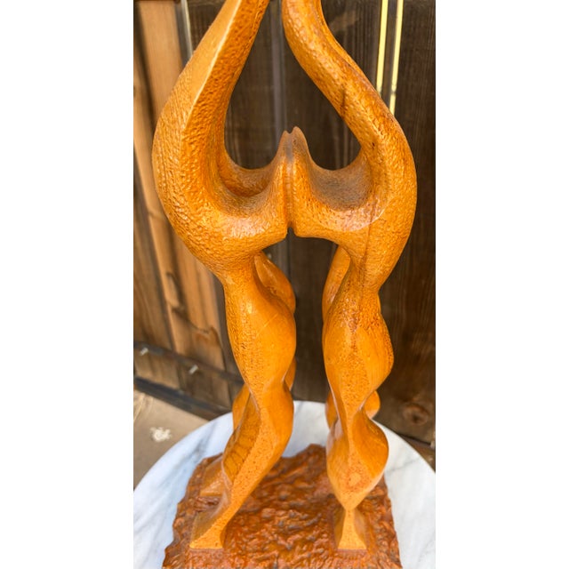 DESCRIPTION: An exceptional and substantial vintage mid-century modern abstract hand-carved wood sculpture. Standing an...