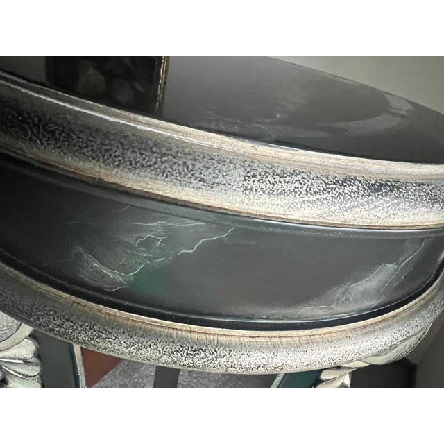 Regency Plant Stand. Finished in old world black lacquer, which is an aged distressed looking finish. With aged antiqued...