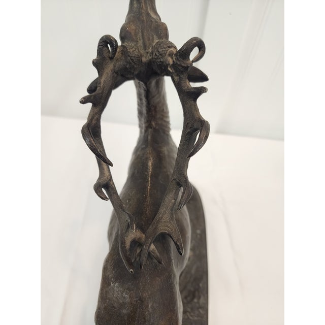 Lovely unmarked elk will fit in a rustic cabin or lodge and grace a mantle beautifully
