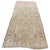 A distinctive antique Karabagh rug with an unusual composition and beautifully stylized floral motifs. A small central...