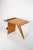 Jens Risom magazine table, model T539, designed in 1949. The rounded, tapered top sits on a single angled slab that passes...