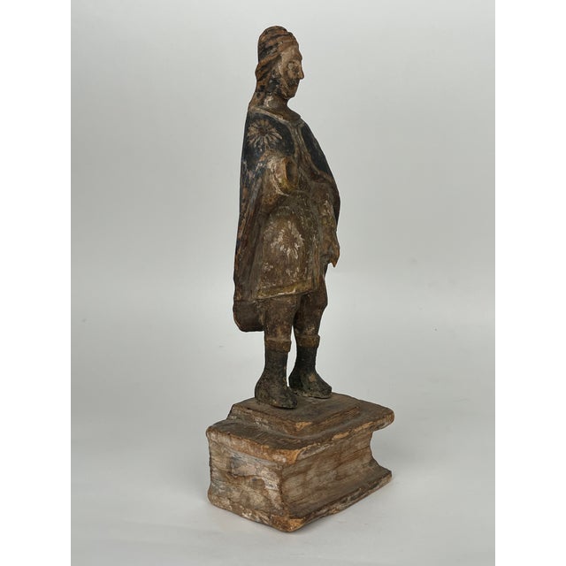 A 17th Century Italian Carved Wood Sculpture Of Saint Roch. Saint Roch was a pilgrim and wonderworker born in Montpellier,...