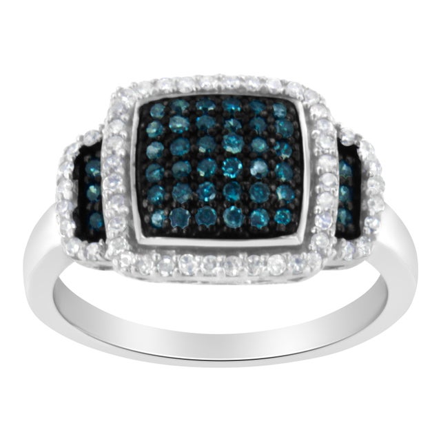 Elegant and timeless, this gorgeous 92.5% sterling silver and diamond cocktail ring features 0.5 carat total weight of...