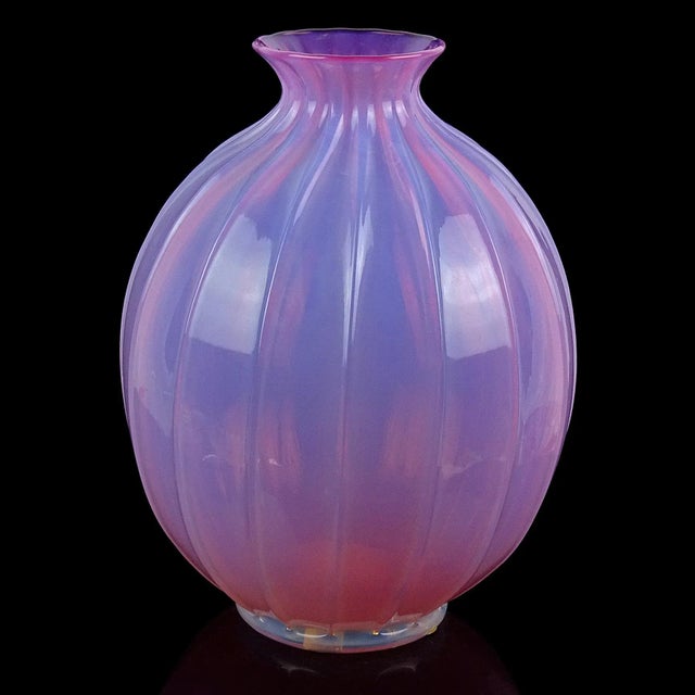 Beautiful and large, vintage Murano hand blown opalescent pink and white foot Italian art glass flower vase. It is...