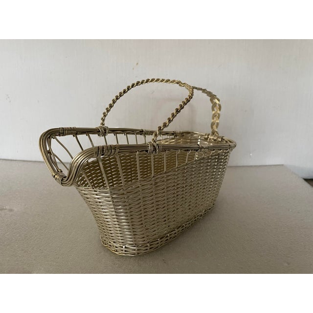 Vintage Bottle Holder by Lino Sabattini for Christofle, 1950s, in Very Good conditions. Designed 1950 to 1959 This piece...