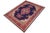 Add classic charm and rich color to your home with this beautiful hand-knotted wool rug measuring approximately 9.9x12.8...