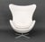 Fritz Hansen White Upholstered Egg Chair, label to seat. 31" H x 34" W x 27" D; seat: 14.5" H. Provenance: From a One...
