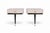 A striking pair of mid-century floating bedside tables, combining elegant light Formica cabinetry with sculptural black...