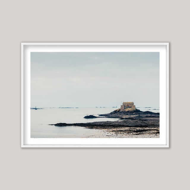 A cool winter photograph of Grand Bé in Saint-Malo, on the rugged north-western coast of Brittany, France. Taken on a...