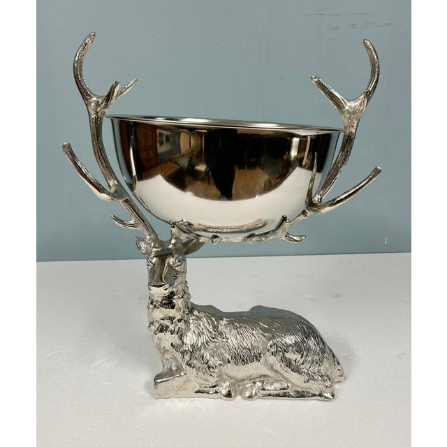 Decorative silver plate stag champagne cooler of striking sculptural form The recumbent deer modelled with finely cast...