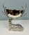 Decorative silver plate stag champagne cooler of striking sculptural form The recumbent deer modelled with finely cast...