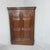 This is a superb quality floorstanding Georgian antique corner cupboard, profusely carved with six reeded panels, in...
