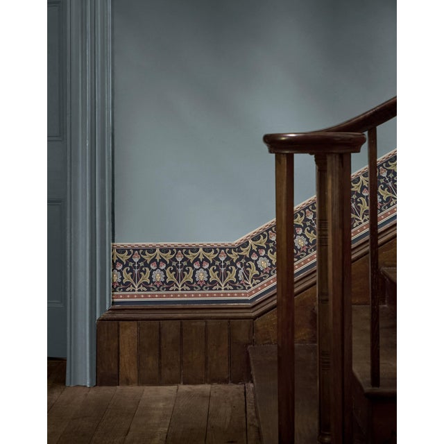 The original artwork suggests it was designed for a carpet border. Stylised floral and leaf formations are edged by...