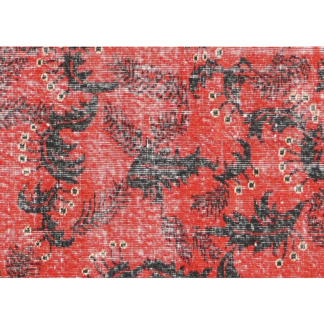 This vintage Turkish Mid-Century Modern rug, measuring 5'6" by 8'9", is handwoven with wool on a cotton foundation in the...