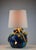 This exceptional French ceramic table lamp, attributed to Vallauris and dating from circa the 1950s, is a remarkable...