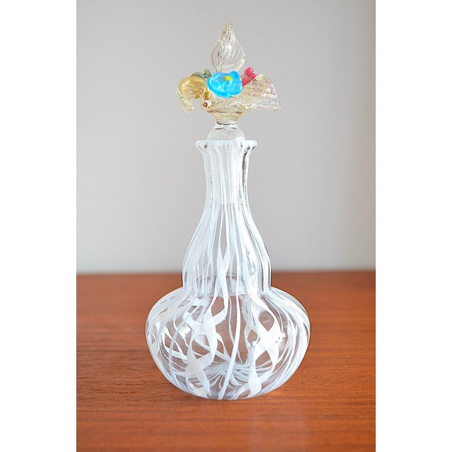 Venetian Murano perfume bottle in a beautiful band Latticino technique – the stopper features a colorful floral design (in...