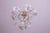Vintage Murano glass chandelier filled with white flowers. The structure of the chandelier is circular and has three...