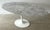 This vintage marble tulip dining table, designed after Eero Saarinen, makes a sweeping modernist statement in any dining...