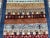 Blue & Rust Afghan Sultani Pictorial Wool Rug, Natural Dye Khorjin Tribal Design, 6′5″ × 9′7″ For Sale - Image 4 of 12