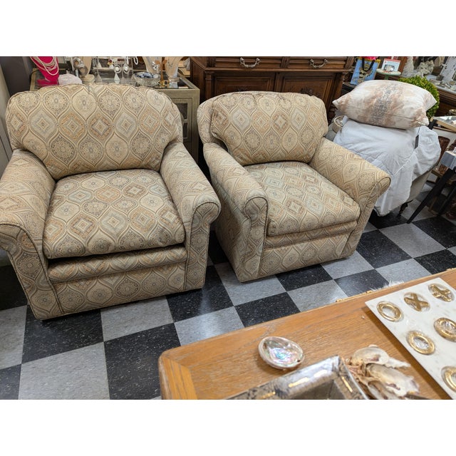 Pair of vintage upholstered barrel chairs. Zip off cushion covers on a blended poly fill cushion. No rip, stains or worn...