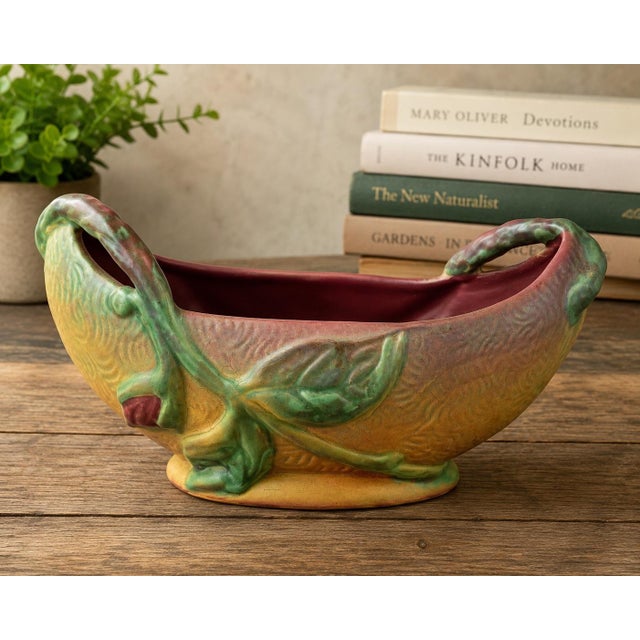 A scarce Weller Pottery Malvern oval jardinière dating to the late 1920s or early 1930s. This sculptural planter features...