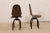 A Spanish pair of iron swivel chairs. This vintage pair of chairs from Spain are fun and quirky! They are constructed from...