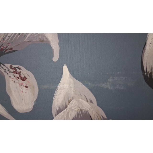 A striking oversized Franco orchid painting, featuring elegant white‑and‑pink orchids arranged in a dark vase against a...