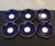 Set of six English Mintons petite blue porcelain saucers with hand-applied 24K gold accents. Circa 1800s. Maker's mark on...