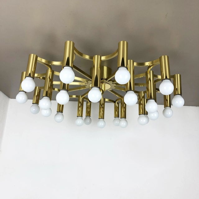 Article: brass ceiling light, flush mount Origin: Italy Age: 1960s This vintage modernist ceiling light was produced in...