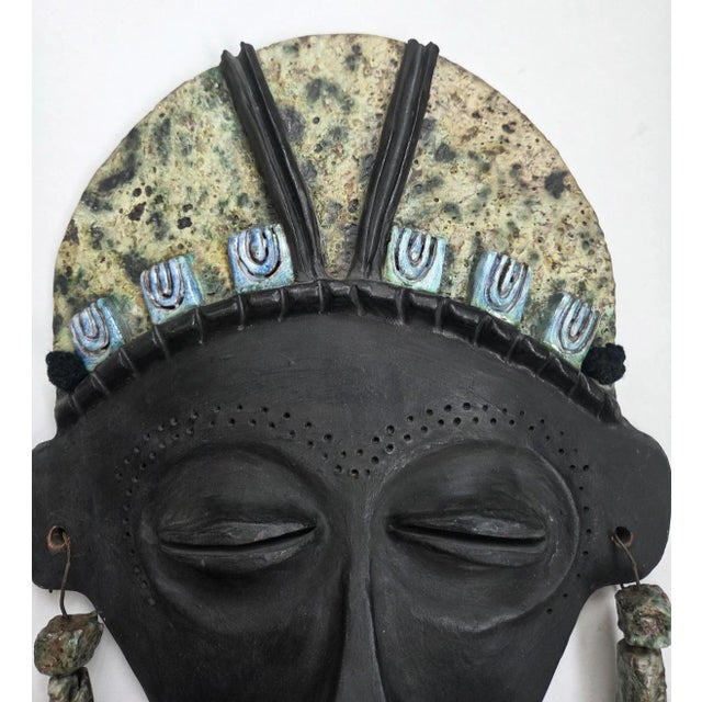 Vintage handmade fired-clay / earthenware wall mask Signed on the reverse “Maria A…” and dated 1986 The mask is a...