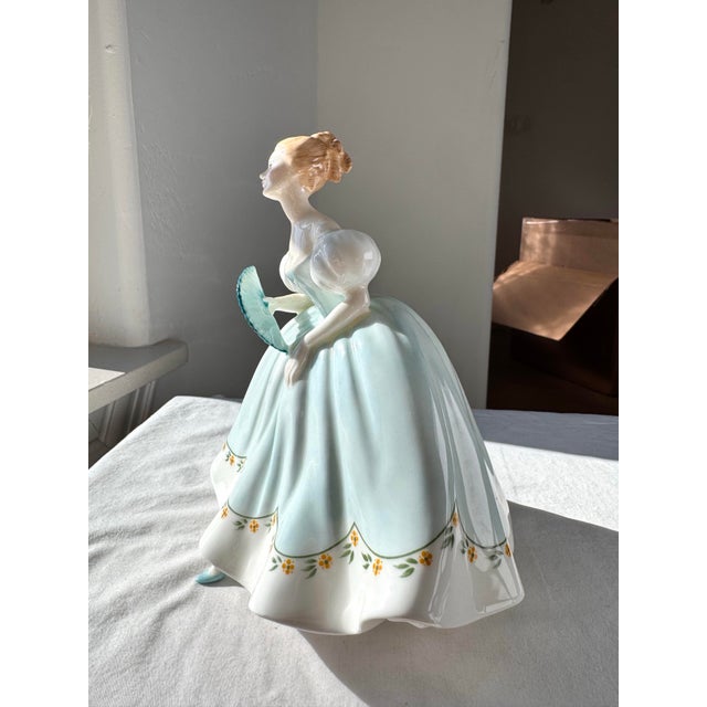 “First Dance” (H.N. 2803), introduced by Royal Doulton in 1968, is a finely modeled bone china figurine from the company’s...