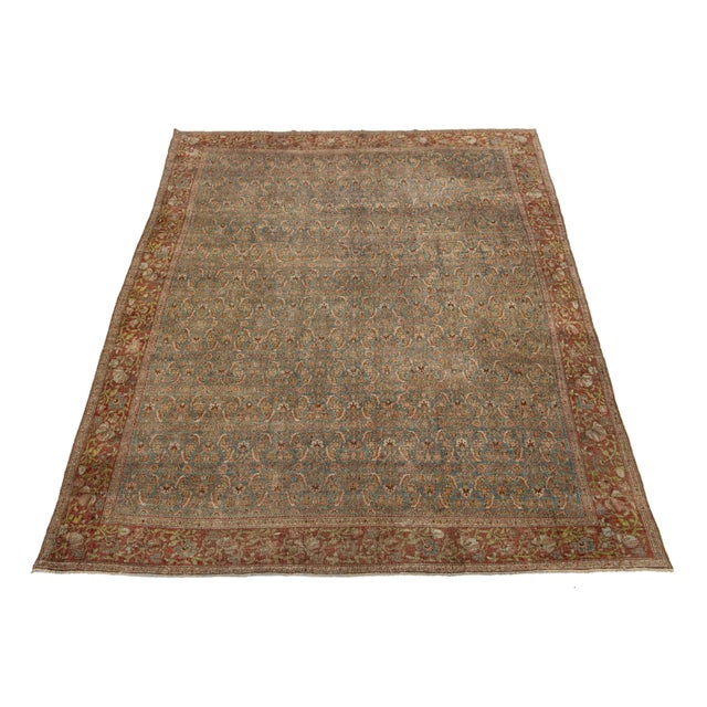 This antique Persian Bidjar wool rug features exquisite hand-knotted wool, showcasing a blue field with an elegant all-...