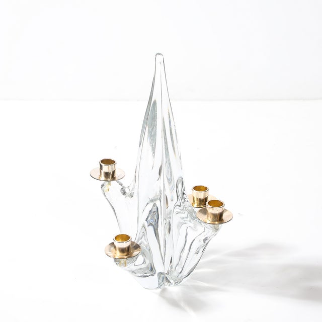 This mid-century amorphic four-arm candelabra, signed Schneider, is a stunning example of French elegance and...