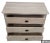 This Coastal Sleek bachelor's chest features three drawers and is crafted from solid wood with a natural wood finish,...