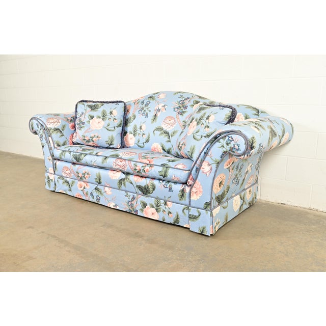 A gorgeous and very comfortable Mid-Century Hollywood Regency floral sofa or loveseat By Baker Furniture USA, Circa 1980s...