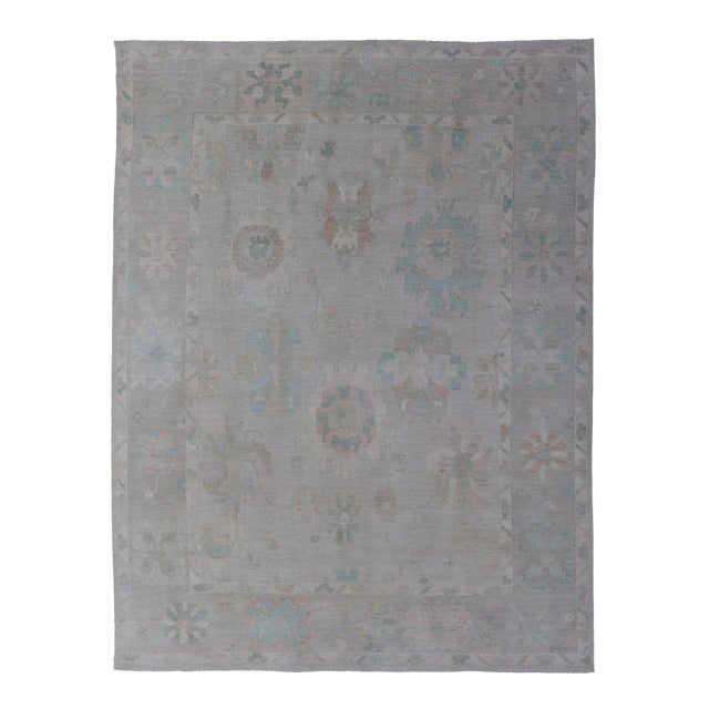 Modern All-Over Floral Oushak With Light Gray Background and Muted Colors For Sale
