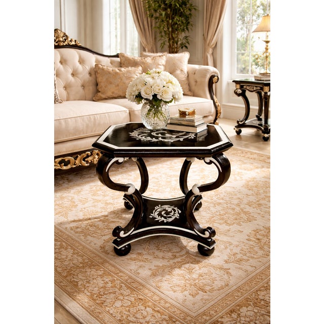 A striking statement piece, this black mother-of-pearl inlay end table brings dramatic elegance and old-world...