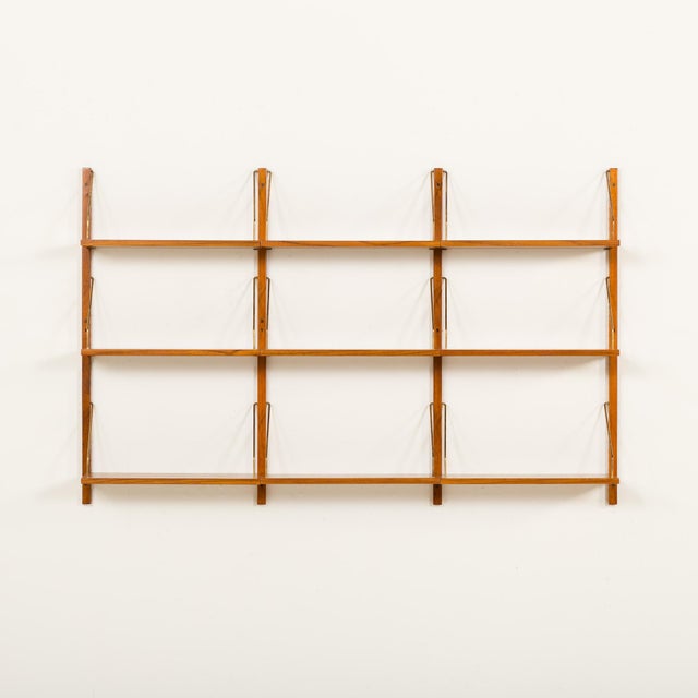 The Danish mid-century teak shelving unit was made originally in the 1960s. Trough the renovation and upcycling we have...