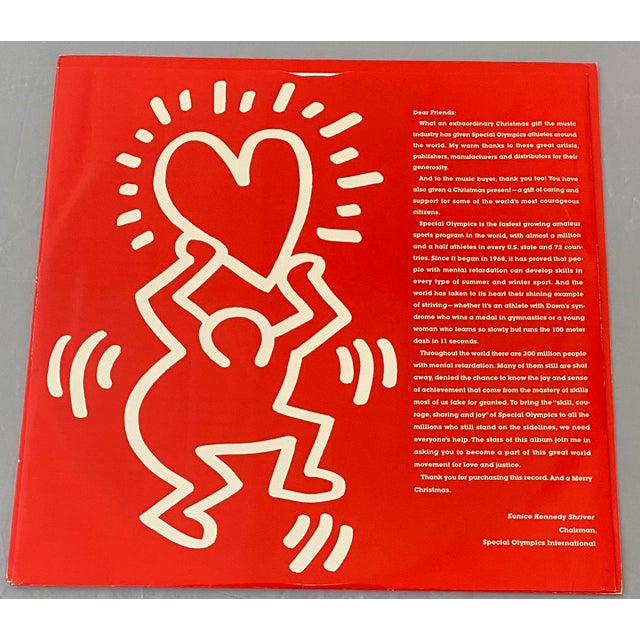 A rare 1987 Vinyl Record Cover Art by Keith Haring and Haring inscribed signature. Looks stunning framed. Dimensions 12.5...