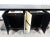 A modern Sideboard or Credenza. All the panels are black or milk glass on a wooden frame. There are 2 drawers behind the...