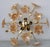 Vintage Murano glass chandelier full of orange iridescente flowers. The chandelier has 5 light points with E14 connection,...