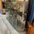 Up for consideration is a beautiful vintage extra large glass Chanel cabinet. This would look lovely in your home, and it...