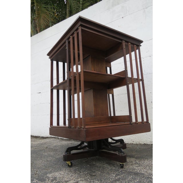 This brilliant Bookcase is made of wood, solid wood, and solid mahogany. The Bookcase is stamped John Danner Co. This...
