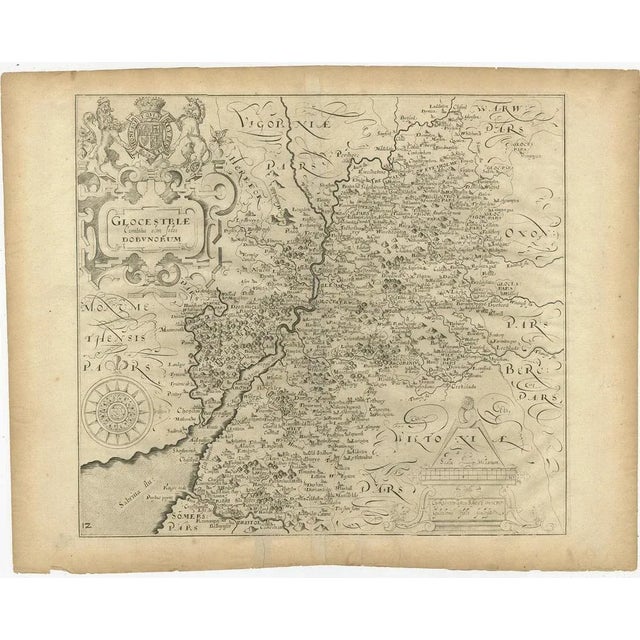 Antique map titled 'Glocestriae comitatus olim sedes Dobunorum'. Map of Gloucestershire, England. This map originates from...