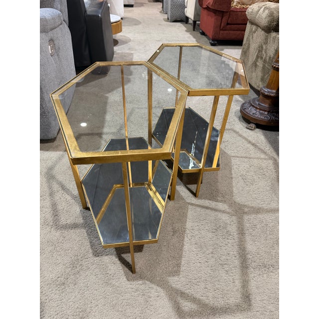 A striking blend of modern glamour and geometric sophistication, this set of two hexagonal side tables by Global Views...