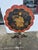 Antique Japanes table hand decorated with figures in the traditional style on an ebonized background with birds and flowers.