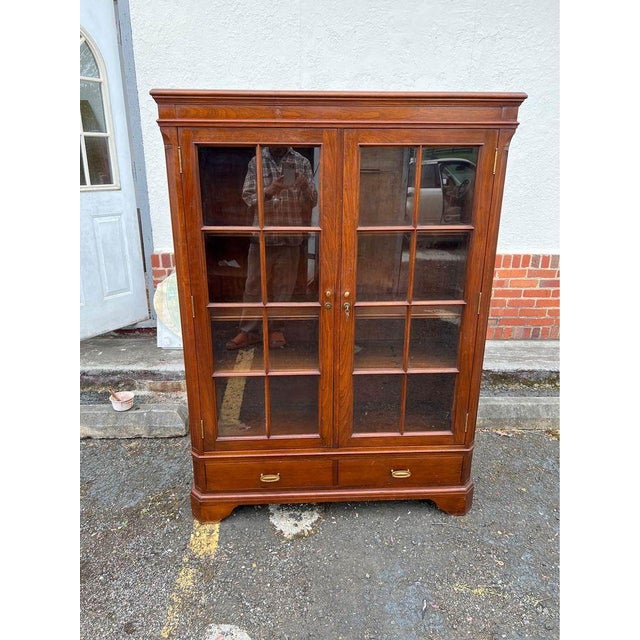 Vintage Solid Wood 2 Door Bookcase. Very well made, finished back, dovetail joint construction Adjustable shelves...