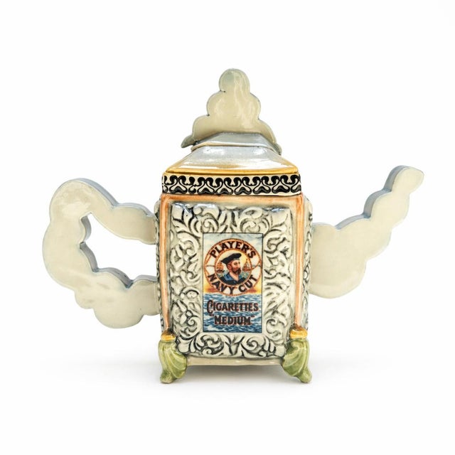 Cigarettes Teapot transforms an everyday object into a witty work of social commentary, blending humor, craftsmanship, and...