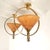 Pair of Mid-Century pendant chandeliers, France 1960s. The vintage lights are made of translucent amber glass paste and...